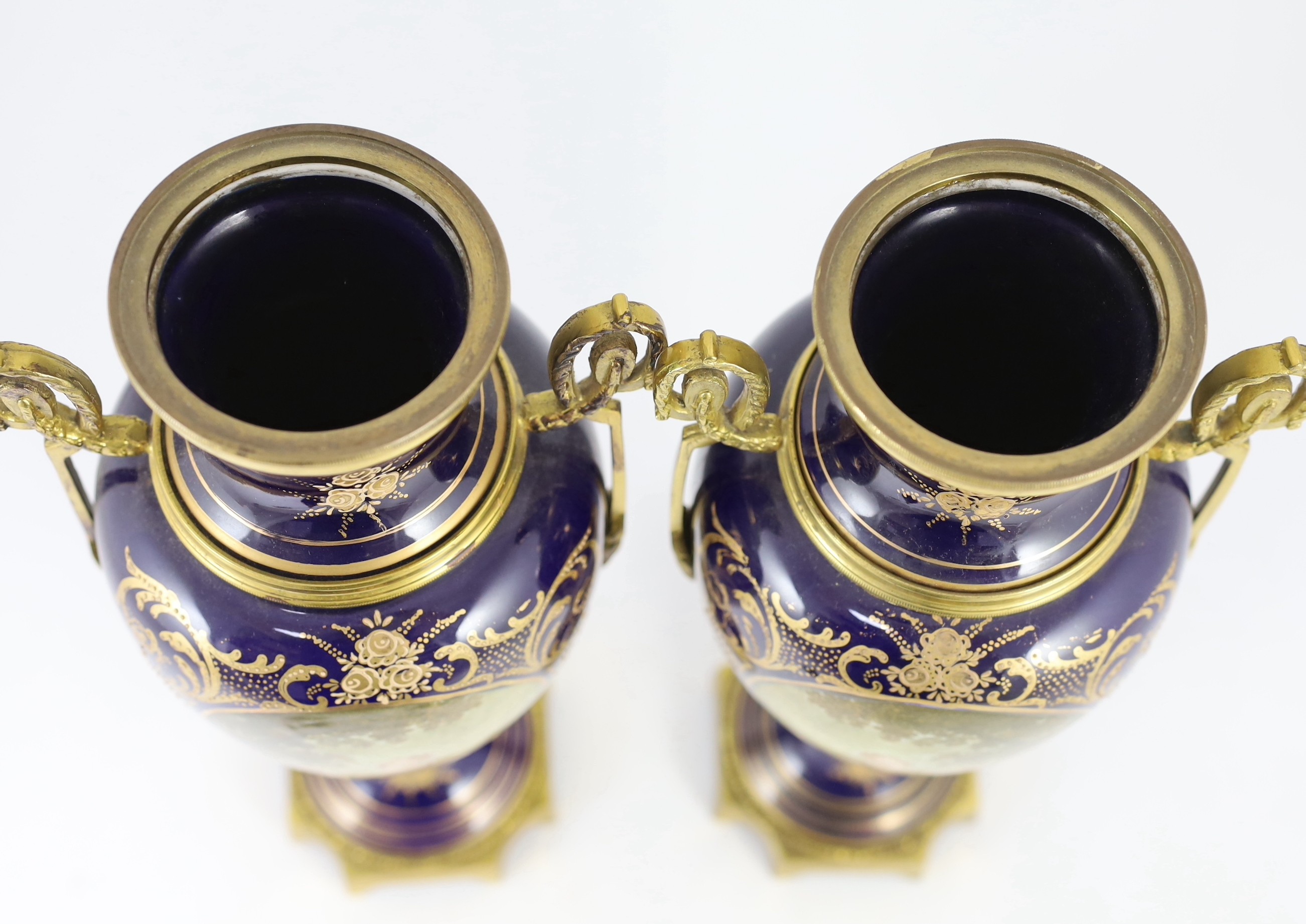 A pair of Sevres style porcelain and ormolu mounted vases, late 20th century, 49 cm high